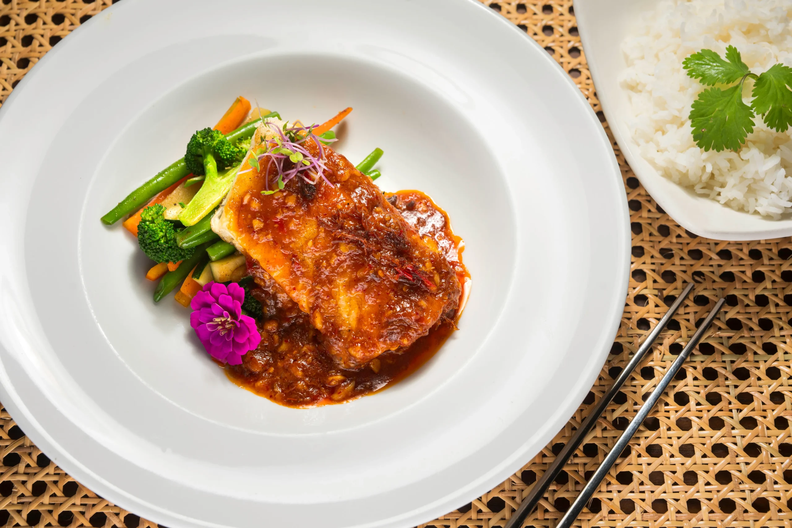 a savory fish entrée with spicy sauce,
