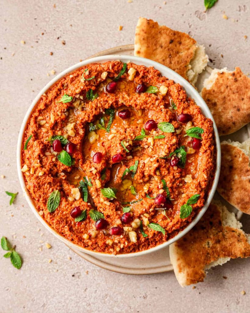 Muhammara made with roasted red peppers and walnuts served at Mezzaluna Jamaica