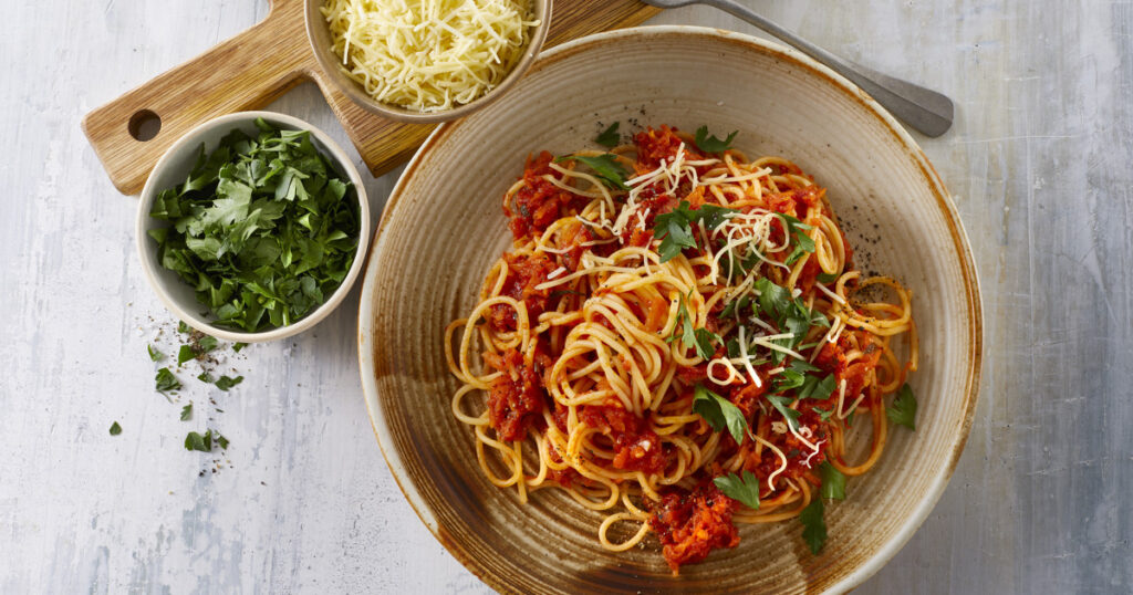 Arabiata pasta bright tomato chili sauce Mezzaluna Jamaica