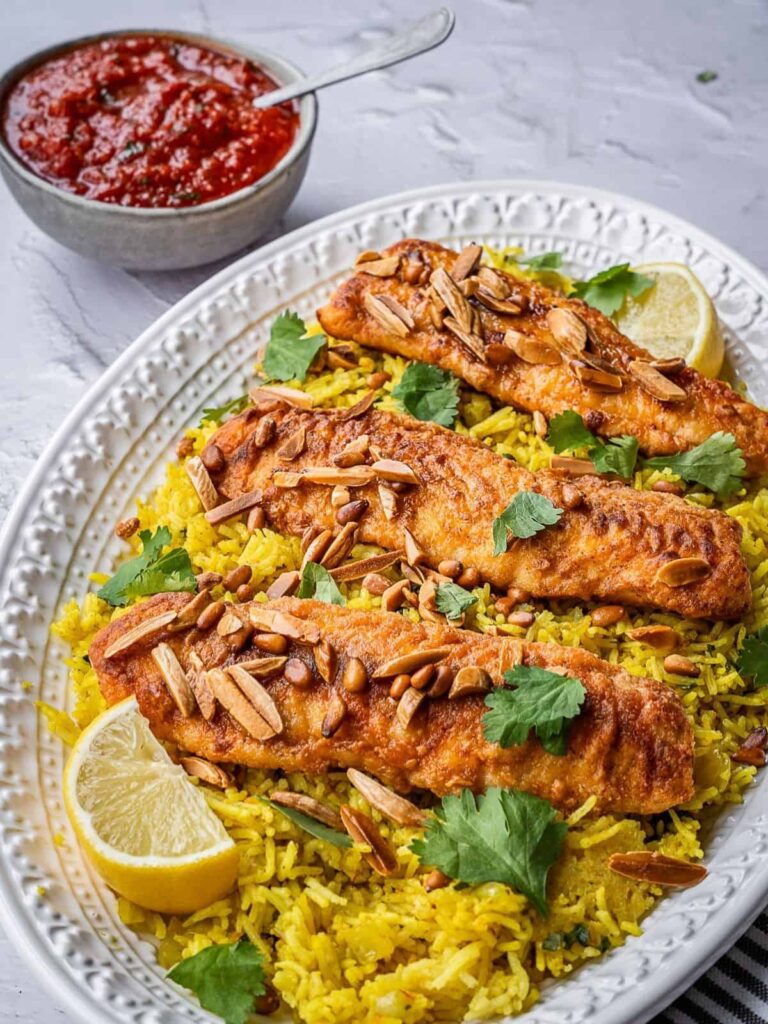 Sayadiyeh salmon with vermicelli rice pine nuts at Mezzaluna Jamaica
